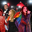 Dua Lipa [right], a headliner at this year's Glastonbury Festival, is considered the favourite to sing the next James Bond theme, potentially following in the footsteps of previous Glastonbury Festival headliners Shirley Bassey and Adele (Credit: Getty Images)