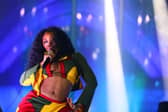 Grammy-award-winner SZA is set to close out the Pyramid Stage on Sunday as Glastonbury Festival 2024 draws to a close (Credit: Getty Images)