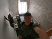 George Redfern, 21, stayed in the cheapest hotel in the UK for £16 a night. Pictured at the Coco Beach Hotel, in Blackpool.