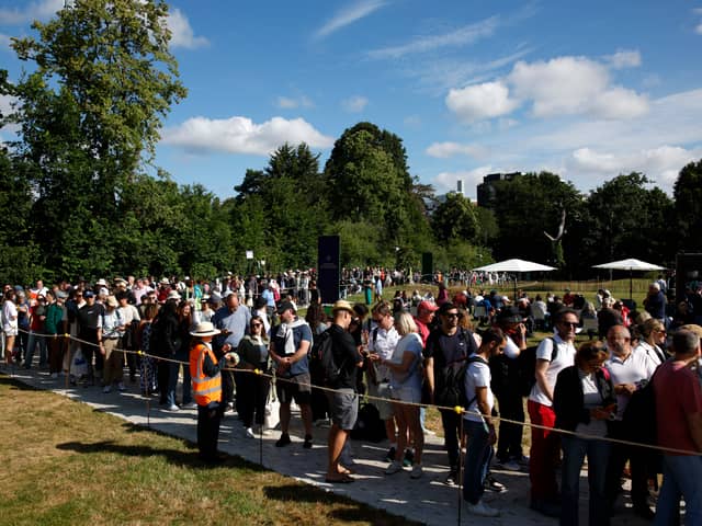 Spectators queue in Wimbledon park ahead of day one of The Championships Wimbledon 2024 at All England Lawn Tennis and Croquet Club on July 01, 2024 in London, England. (Photo by Adam Pretty/Getty Images)