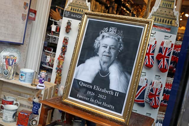 Queen Elizabeth II themed memorabilia on sale near Birdcage walk near the gates of Buckingham Palace.