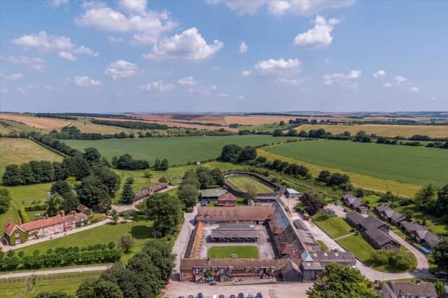 The 63 acre property includes a main house, stables and a big office space.