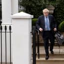 Former PM Boris Johnson leaving his home for the Commons Privileges Committee