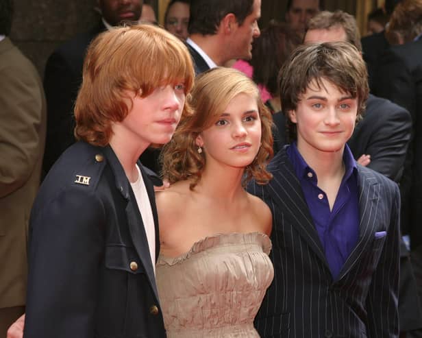 Actor Rupert Grint, Actress Emma Watson, and Actor Daniele Radcliffe attend the Premiere of Harry Potter  (Thos Robinson/Getty Images)