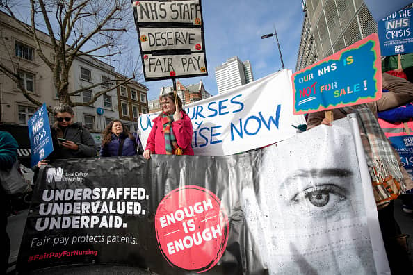 Members of the Royal College of Nursing union could strike until Christmas if no deal is reached with the government over pay.  (Photo by Hesther Ng/SOPA Images/LightRocket via Getty Images)