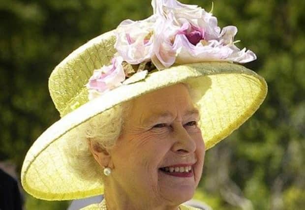 Monarch holds title of top regal smile alongside Queen of daytime TV, Holly Willoughby