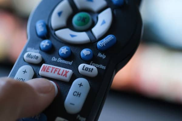 With tough competition from fellow streaming services, Netflix is dedicated to cracking down on password sharing amongst its users (Photo by CHRIS DELMAS/AFP via Getty Images)