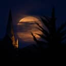 The Flower Moon of May 2020 (which was also a ‘supermoon’) rising above the village of Brixworth (Photo: Clive Mason/Getty Images)