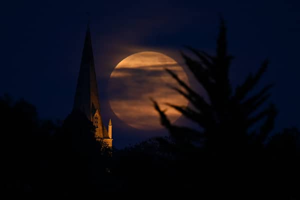 The Flower Moon of May 2020 (which was also a ‘supermoon’) rising above the village of Brixworth (Photo: Clive Mason/Getty Images)
