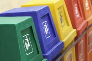 A row of recycling bins in different colors at a recycling station. (photo:iStock)