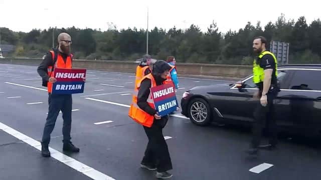 Insulate Britain: protesters decide to change tactics and walk towards oncoming traffic on M25 motorway (Photo: Insulate Britain)