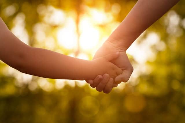 Holding Hands (photo: Getty Images)