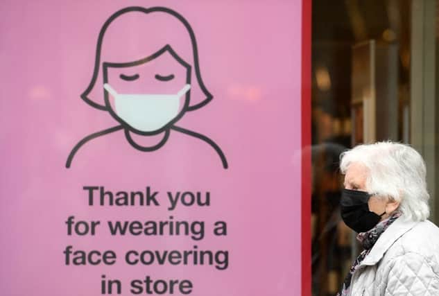 Social distancing, face masks and working from home requirements could all be dropped in England by next month (Photo: OLI SCARFF/AFP via Getty Images)