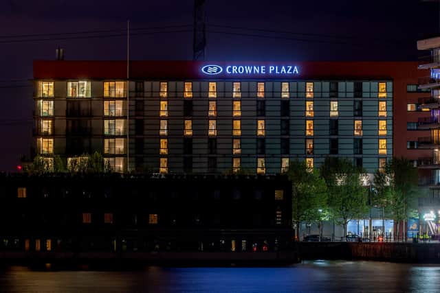  The word open lights up the Crowne Plazain Docklands London to mark the reopening of Hotels on the 17th of May.