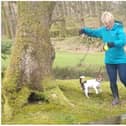 Murdered PCSO Julia James walking her Jack Russell Toby and wearing a light blue waterproof coat, blue jeans and dark coloured Wellington style brown boots - the same clothes she had on when last seen before her murder (Kent Police)
