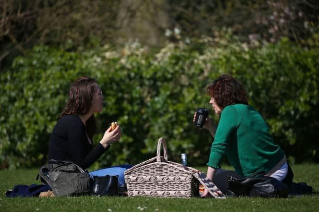 The UK is set to experience some warmer temperatures (Photo: HOLLIE ADAMS/AFP via Getty Images)