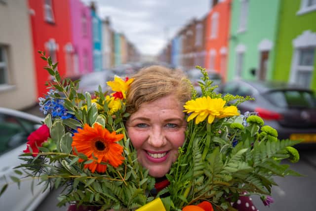 Tash Frootko, 44, has been painting houses in Gloucester since 2018 - giving a makeover to entire streets and squares.