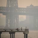 The New York city skyline and east river shrouded in smoke in Brooklyn as smoke from the hundreds of wildfires blazing in eastern Canada drifted south (Photo: Getty Images)