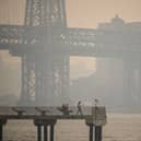 The New York city skyline and east river shrouded in smoke in Brooklyn as smoke from the hundreds of wildfires blazing in eastern Canada drifted south (Photo: Getty Images)