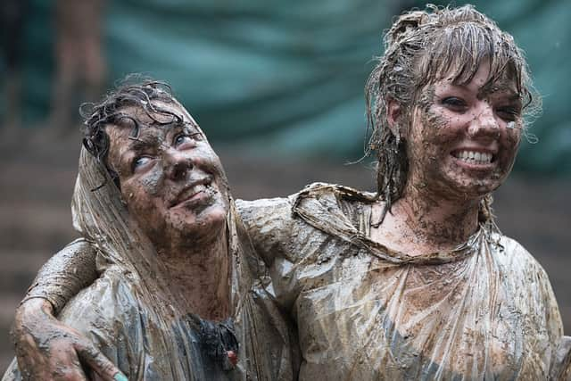 Muddy festival goers at Glastonbury will be able to get a free shower this year