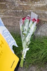 A murder probe has been launched after a 10-year-old girl was found dead at a house in Surrey 