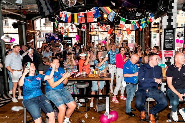 England fans celebrate beating Australia to reach the World Cup Final. pictured in Box Leeds, West Yorks, Aug 16 2023.
