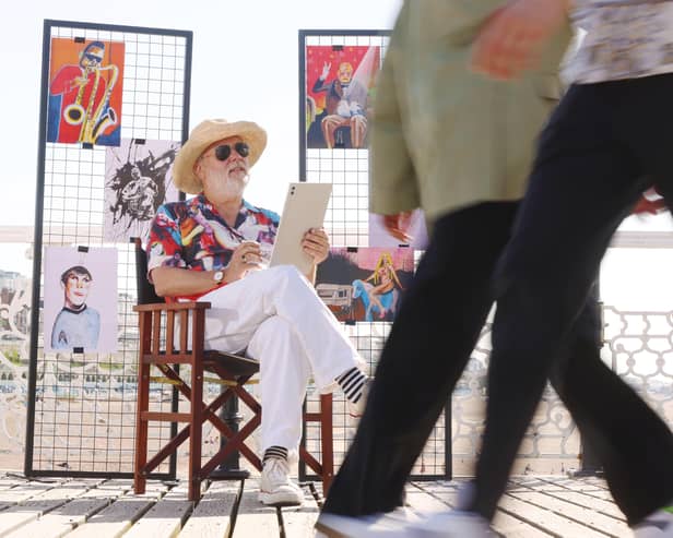 Jim Moir illustrates members of the public at the seaside