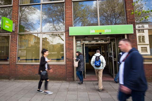 People walk near the Jobcentre in Westminster.