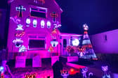 The house in Bristol is covered with around 8,000 lights to raise money for charity at Halloween