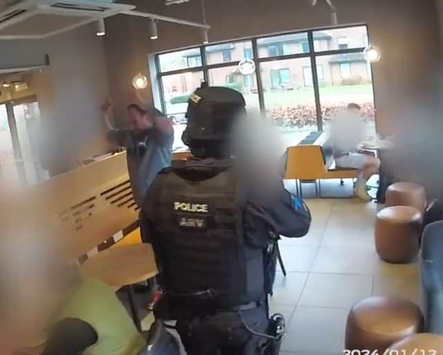 Armed police arrest man in Starbucks