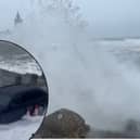 Waves soak car as Storm Kathleen batters British coast.
