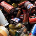 A pile of dead batteries. Photo: Manjunath Kiran/AFP via Getty Images