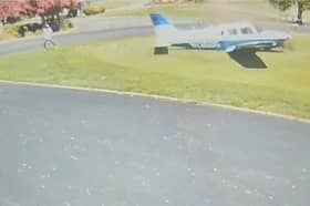 Plane smashes into golf course narrowly missing golfer.