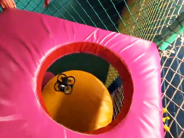 Fascinating footage shows police training drone pilots - in a children's soft play centre. 