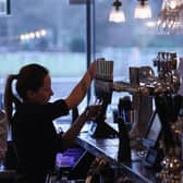 Wetherspoon is slashing prices on seven drinks next week - at more than 700 of its pubs (Photo by Oli Scarff/Getty Images)