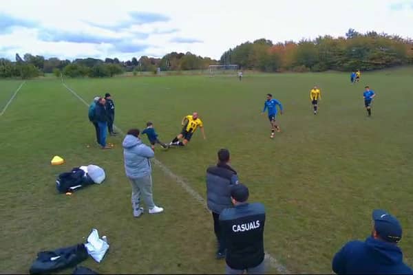 Reggie, 12, accidentally being slide tackled by non-league footballer Terry.
