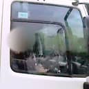 Shocking footage shows HGV driver caught eating yoghurt at the wheel
