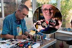 Mark Taylor, a retired art teacher, paints music-themed portraits and album sleeves onto old tin lids and leaves them for gig-goers to take at Waterloo Music Bar.