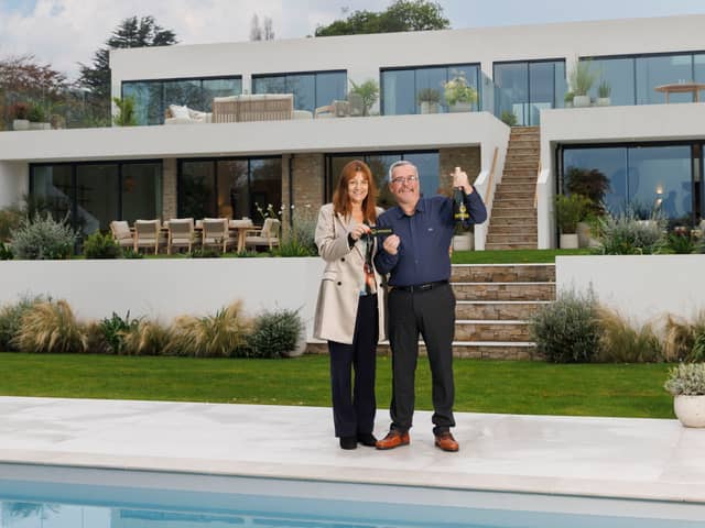 Tom and Carol Steenson - Omaze Million Pound House Draw winners at their new £2m home in Devon. 