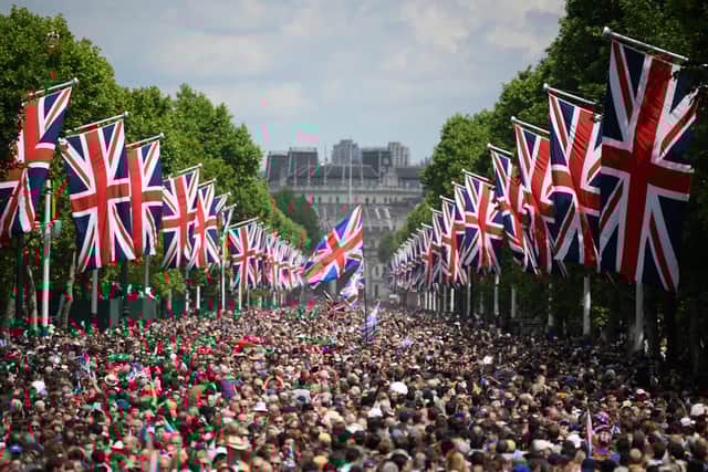 Members of the public fill The Mall before a flypast during the Queen's Birthday Parade, the Trooping the Colour, as part of Queen Elizabeth II's Platinum Jubilee celebrations in London in June 2022 (Photo: DANIEL LEAL/POOL/AFP/AFP via Getty Images)