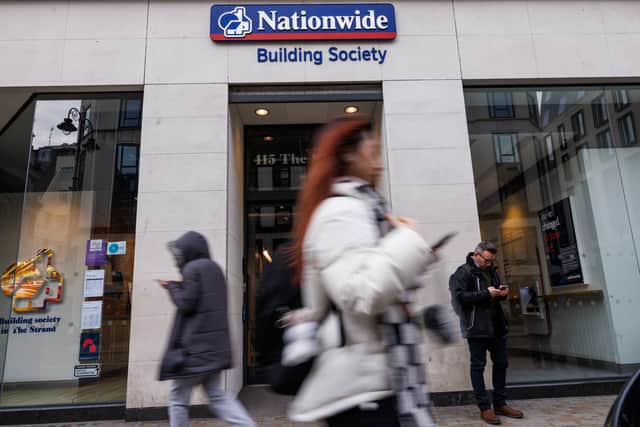 Members of the public walk past the Nationwide Building Society in London (Photo: Dan Kitwood/Getty Images)