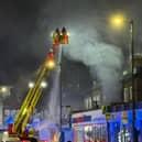 London Fire Brigade tackle a fire at a takeaway in Holloway. 