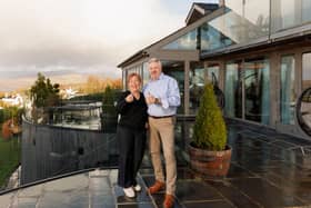 Omaze winners Catherine & Chris Carwardine at their £3 million mansion in Lake Windermere. 