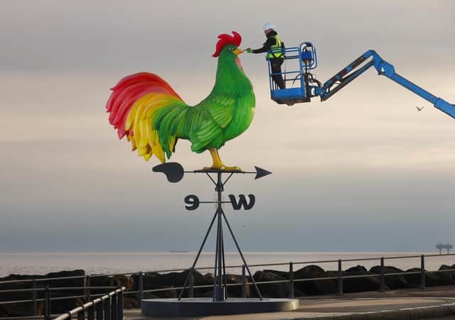 The weathervane stands at 21ft tall