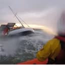 RNLI preparing to rescue passengers on a yacht