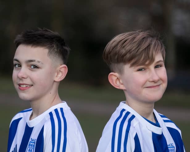 Flo Topham (L) and Camille Porhel, who play for York Railway Institute (YRI) AFC u12s Girls, have launched a campaign defending their right to have short hair, after they were accused of being boys during a game. 