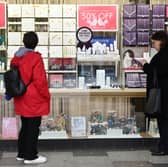 Two women look at a jewellery shop window in Stevenage, north of London, in 2024 (Photo: JUSTIN TALLIS/AFP via Getty Images)