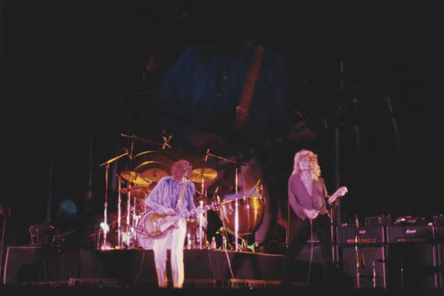 Jimmy Page and Robert Plant of English rock group Led Zeppelin perform live on stage at the Knebworth Festival at Knebworth House in Hertfordshire, England in August 1979.