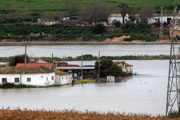 Houses in the middle of a flooded area after Storm Laurence passed through El Palmar de Troya in southern Spain, before Martinho swept in.