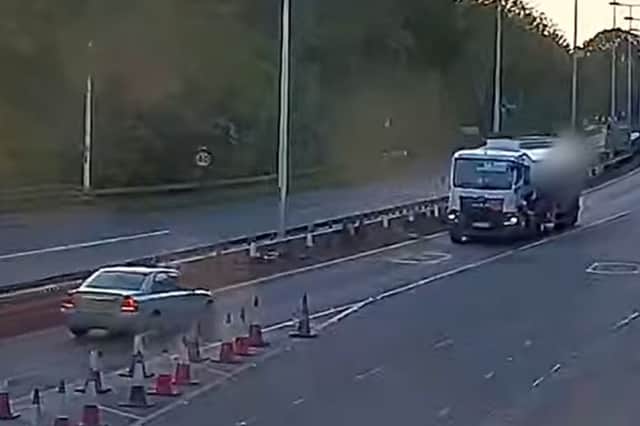 Driver travels towards oncoming traffic on dual carriageway.